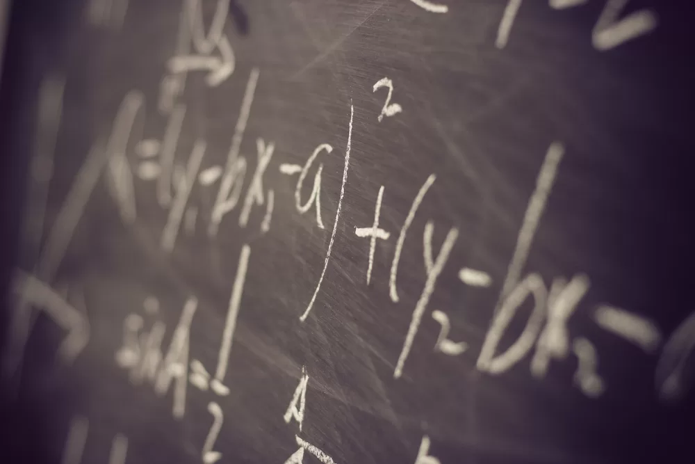 math equations on a chalkboard
