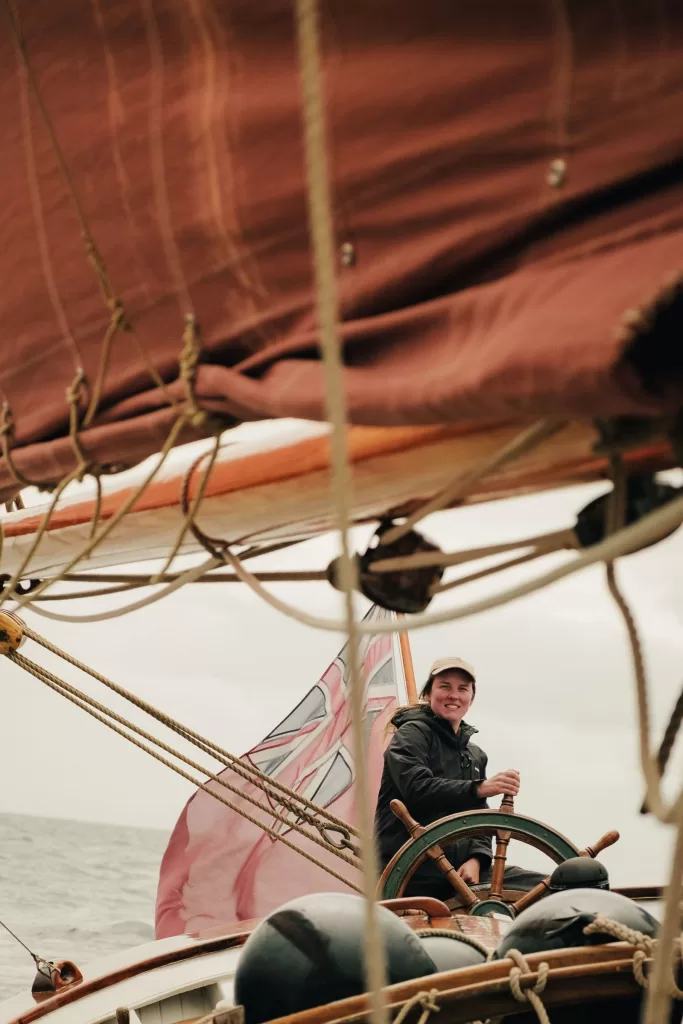 Image may contain Carmen Thalmann Boat Sailboat Transportation Vehicle Person Face Head Photography and Portrait